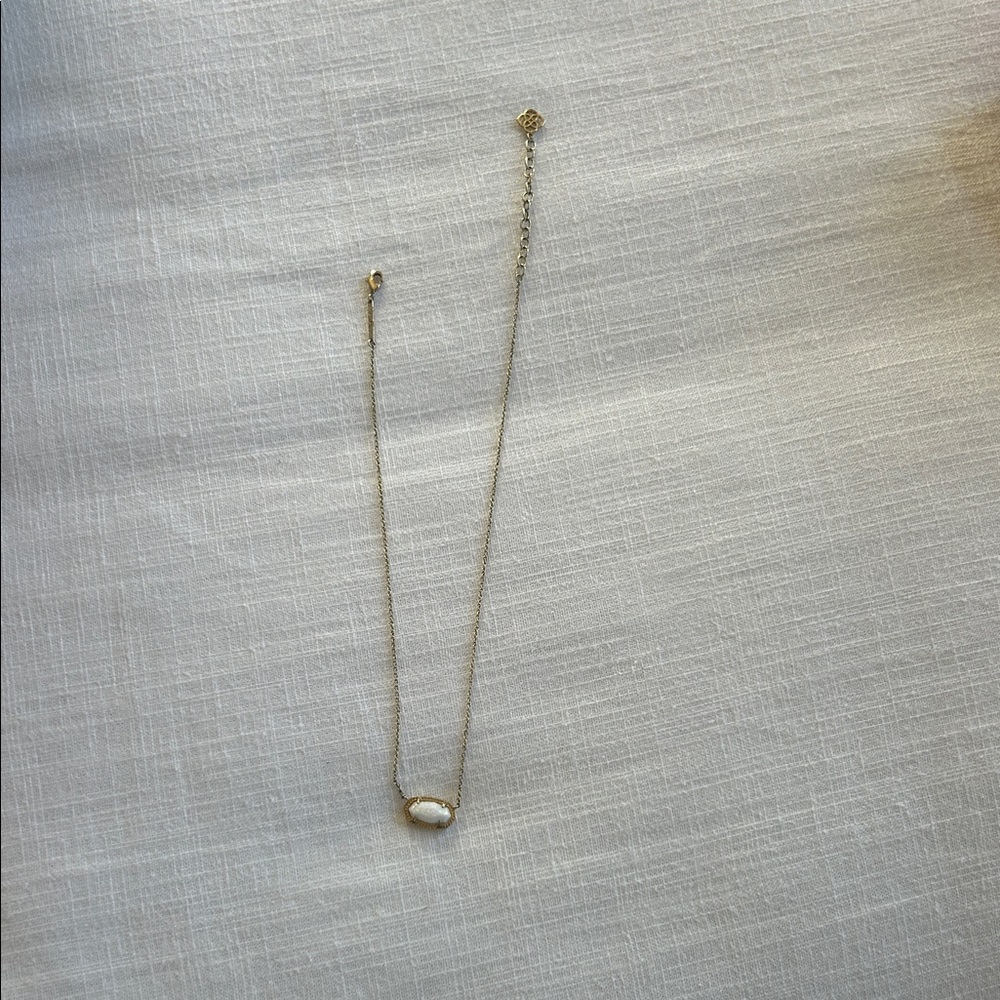 Elegant Gold and White Necklace